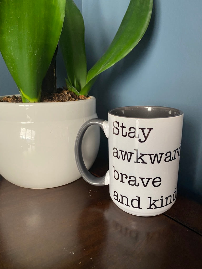 Stay awkward brave and kind coffee mug
