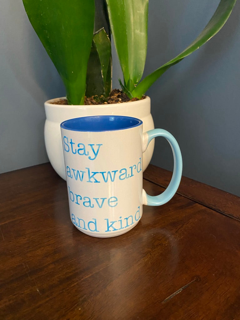 Stay awkward brave and kind coffee mug